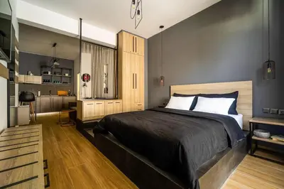 a bedroom with a large bed in a room at Super Stylish Apartments in the Heart of Athens! in Athens
