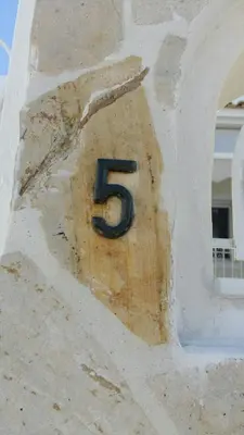 a number on the side of a building at NN Spata Rooms & Suites near Athens airport in Spáta