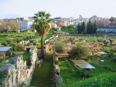a city with a palm tree in a field at Gazi apartment with Acropolis views in Athens