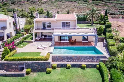 an aerial view of a house with a swimming pool at Amazing 5 bedroom Villa with Swimming Pool in Athens