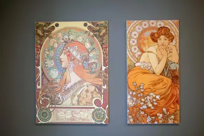 two paintings of a woman on a wall at Abstract Flat With Urban View in Athens