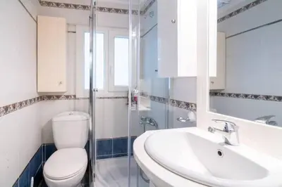a bathroom with a toilet and a sink and a shower at Studio in the city center, Syntagma in Athens