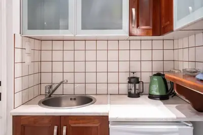 a kitchen with a sink and a counter top at Studio in the city center, Syntagma in Athens