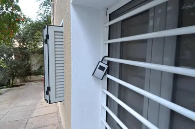 an open door of a house with a window at Acropolis, a nice and minimal apartment in Athens