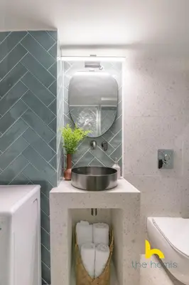 a bathroom with a sink and a mirror at Sun-splashed sanctum with big balconies, Acropolis 2 in Athens