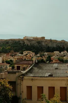 a view of a city with a roof at Azelia Suites - Acropolis View in Athens