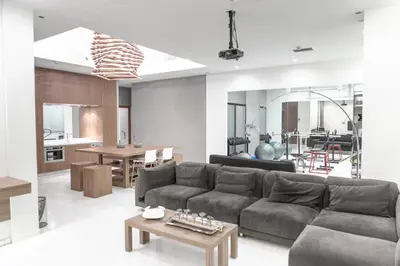 a living room with a couch and a table at Azelia Suites - Acropolis View in Athens