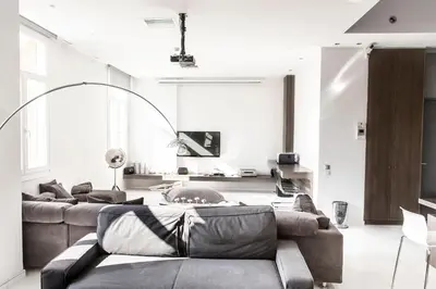 a living room with two couches and a tv at Azelia Suites - Acropolis View in Athens