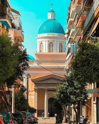a large building with a dome on top of it at Royal Blue Grand Suite No 3 in Piraeus