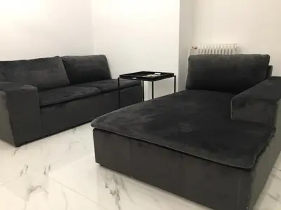 a living room with a couch and a coffee table at Patision Avenue, Apartment with Two bedrooms in Athens