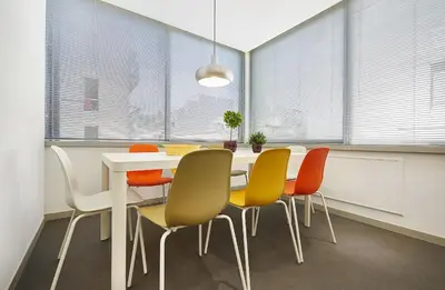 a dining room with a table and chairs at Chloe Boutique Apartments Apollo in Athens