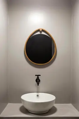 a bathroom with a white sink and a mirror at Thisean Modern Suites By Athens Stay in Athens