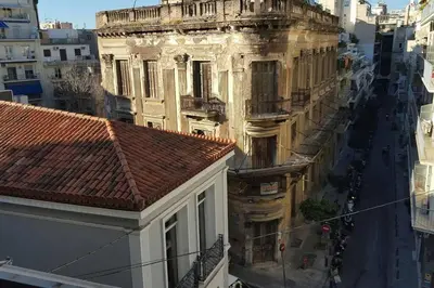an old building in a city with a street at 2BDR Boutique Full Apt in Plaka (BIG BALCONY) in Athens