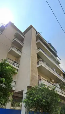 a tall building with balconies on the side of it at Romantic Jacuzzi Apartment in Athens
