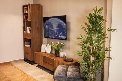 a living room with a couch and a table at Central Comfy Modern Flat 2 bedrooms 2 bathrooms in Athens