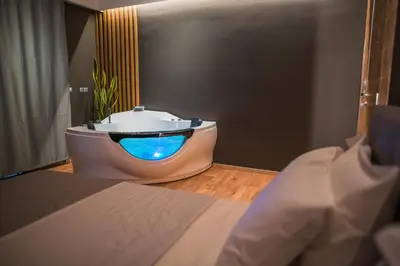 a bathroom with a toilet with a blue light on it at NOHO Boutique , premium living Lazeon 7 in Athens