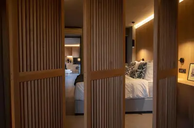 a view of a bedroom with a bed in it at Groovy in Athens