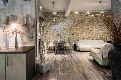 a bedroom with a bed and a table in a room at Unique Luxury House in Athens