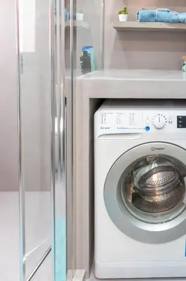 a laundry room with a washer and dryer at Martin's Akropolis Studio in Athens