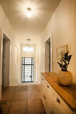 a room with a counter with a vase on it at Bentzi...Boutique Apartment 6, Superior Suite for 4 Guests in Athens
