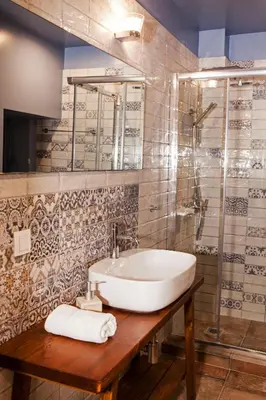 a bathroom with a sink and a shower at Bentzi...Boutique Apartment 6, Superior Suite for 4 Guests in Athens