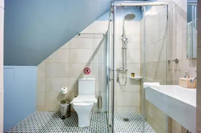a bathroom with a toilet and a sink and a shower at Bentzi...Boutique Apartment 1, Classic Double with kitchenette, 2 Guests in Athens