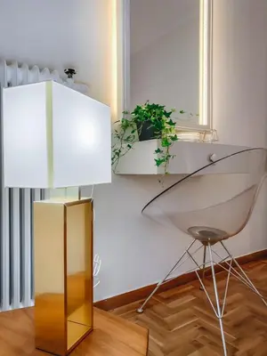 a white table with a mirror and a chair at API Projects Kolonaki - Casa Academia in Athens