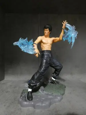 a figurine of a man with feathers on at Cinema Lovers in Athens