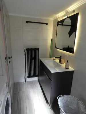 a bathroom with a sink and a mirror at Cinema Lovers in Athens