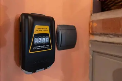 a pay phone is attached to a wall at Brand New Aprt with backyard in Lycabettus Hill ! in Athens