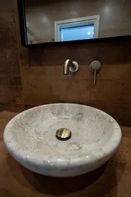 a white sink in a bathroom with a mirror at Triple A - Prime Location - Between Monastiraki & Syntagma Square-FREE Parking! in Athens