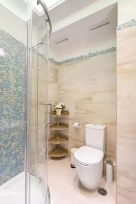 a bathroom with a toilet and a shower at Bright, Calming Retreat With a Balcony Near Metro! in Athens