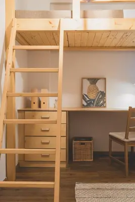 a loft bed with a desk in a room at 90m2 Luxury Apartment in the Heart of Athens - Living Stone Sunstone in Athens