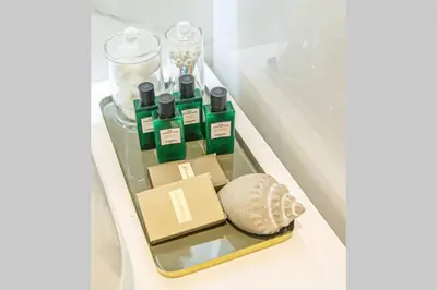 a refrigerator with bottles and a rock in it at EcoStay-Serenity,business class apartment by the sea in Alimos Kalamaki in Athens