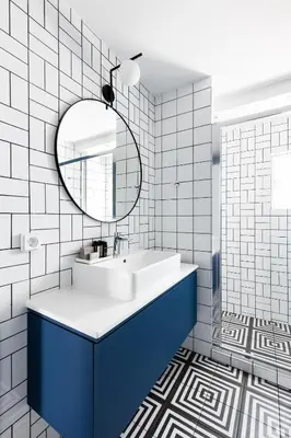 a bathroom with a sink and a mirror at Iconic 1BR Apartment in Koukaki by UPSTREET in Athens