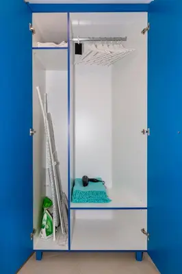 a closet with a blue and white door at Blue And White Apartment VIPGreece in Athens