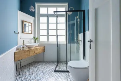 a bathroom with a shower and a toilet and a sink at Moon And Stars Athens in Athens