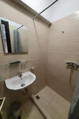 a bathroom with a sink and a mirror at City Center Athenes rooms in Athens