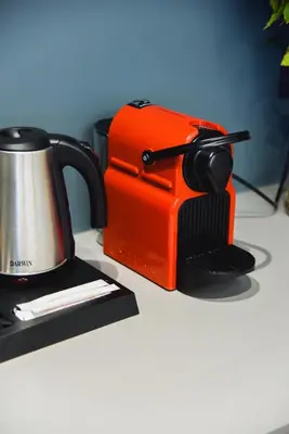 a coffee pot sitting on top of a counter at CentraL44 OMG Casual Suite-Ermou view in Athens