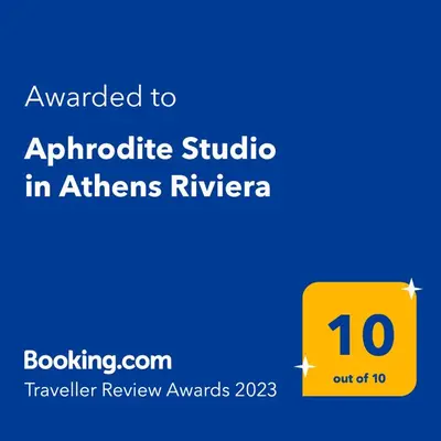 a yellow sign that saysauthorized to antiparticle studio in athens riviera at Aphrodite Studio near Athens Floisvos Marina in Athens
