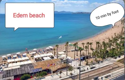 a view of a beach with a speech bubble saying eternal beach at Aphrodite Studio near Athens Floisvos Marina in Athens