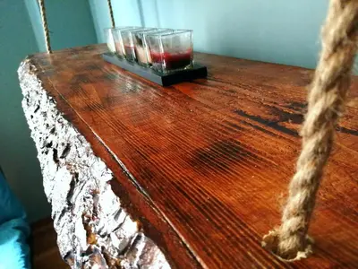 a wooden table with two glasses on top of it at Comfortable Modern Entire House near the center of Athens-Blue Serenity in Athens
