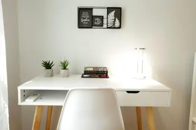a white desk with a chair in a room at Super Comfrortable Modern Apartment in Kolonaki in Athens