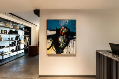 a painting hanging on a wall in a room at The Modernist Athens in Athens