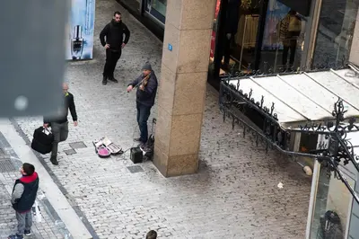 a group of people walking down a street at CentraL44 YoLo Casual Suite- Ermou in Athens
