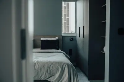 a bedroom with a bed and a window at Bango Loft Chalandri, with private parking in Athens