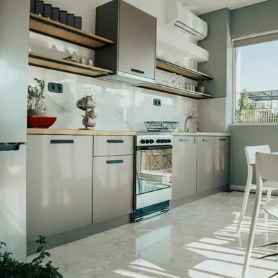 a kitchen with white cabinets and a stove at Bango Loft Chalandri, with private parking in Athens