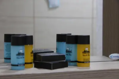 a row of hair products sitting on a shelf at Elikon in Athens