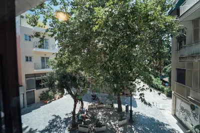 an overhead view of a courtyard with trees and buildings at Luxury Apartment in Plaka - Acropolis (Rosemary) in Athens