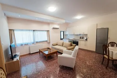 a living room with a couch and a table at Luxury Apartment in Plaka - Acropolis (Lavender) in Athens